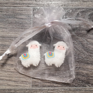 White alpaca needle stoppers in organza bag