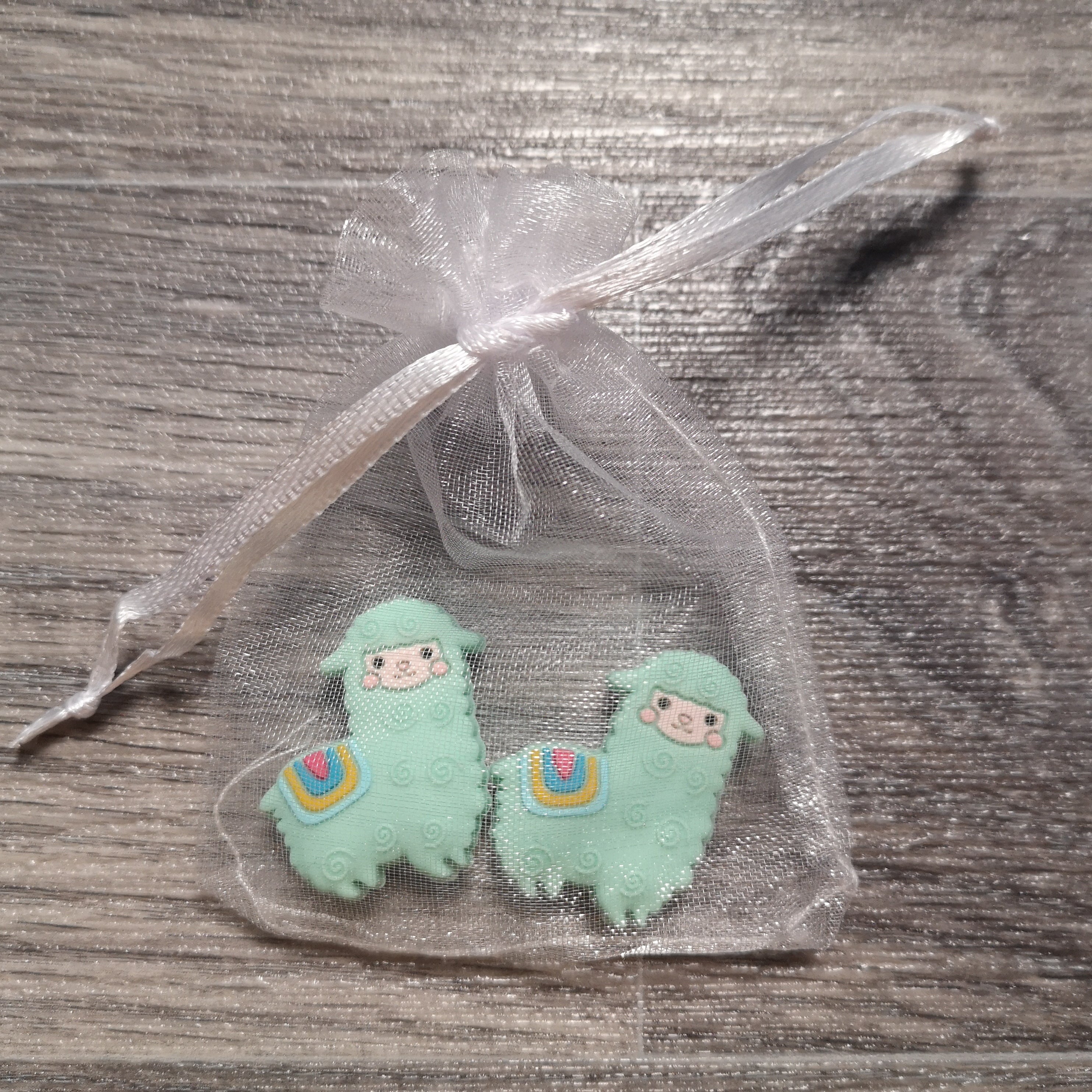 Mint alpaca needle stoppers in organza bag